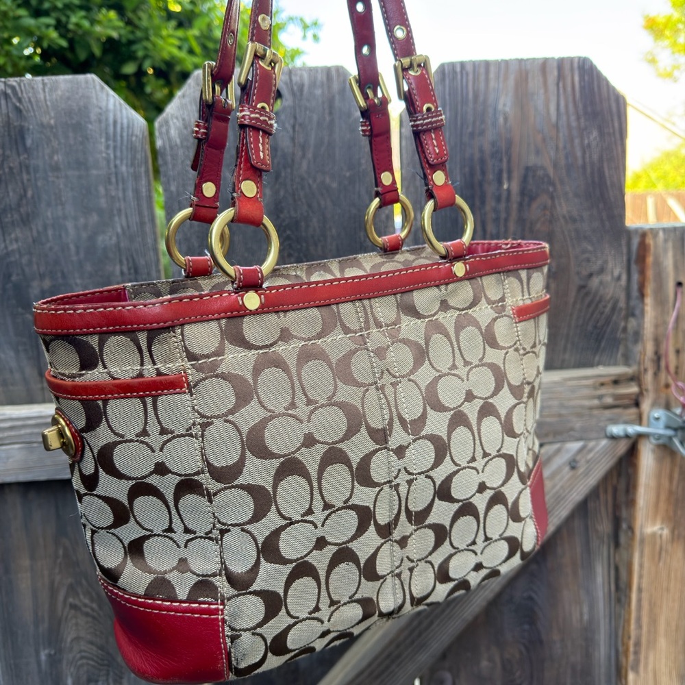 SOLD ‼️ Coach Brown Signature Canvas Turnlock Shoulder Bag with Red Leather Trim